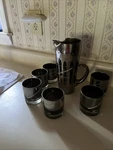 United States Steel Cocktail Pitcher W/6 Glasses Your Pipe Connection. Fixed Price $30.00.