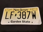 Lf 387W License Plate Nj (new Jersey) Yellow Black Stamped Collectible. Fixed Price $10.75.